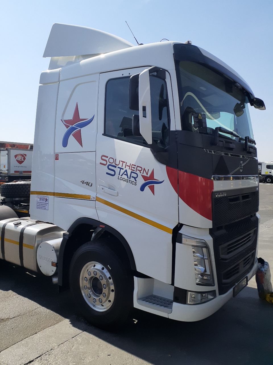Fleet of Southern Star Logistics trucks with custom branding in Johannesburg
