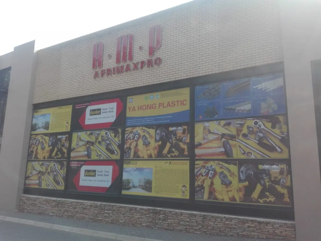 AfriMaxPro shopfront window graphics and branding installation Johannesburg